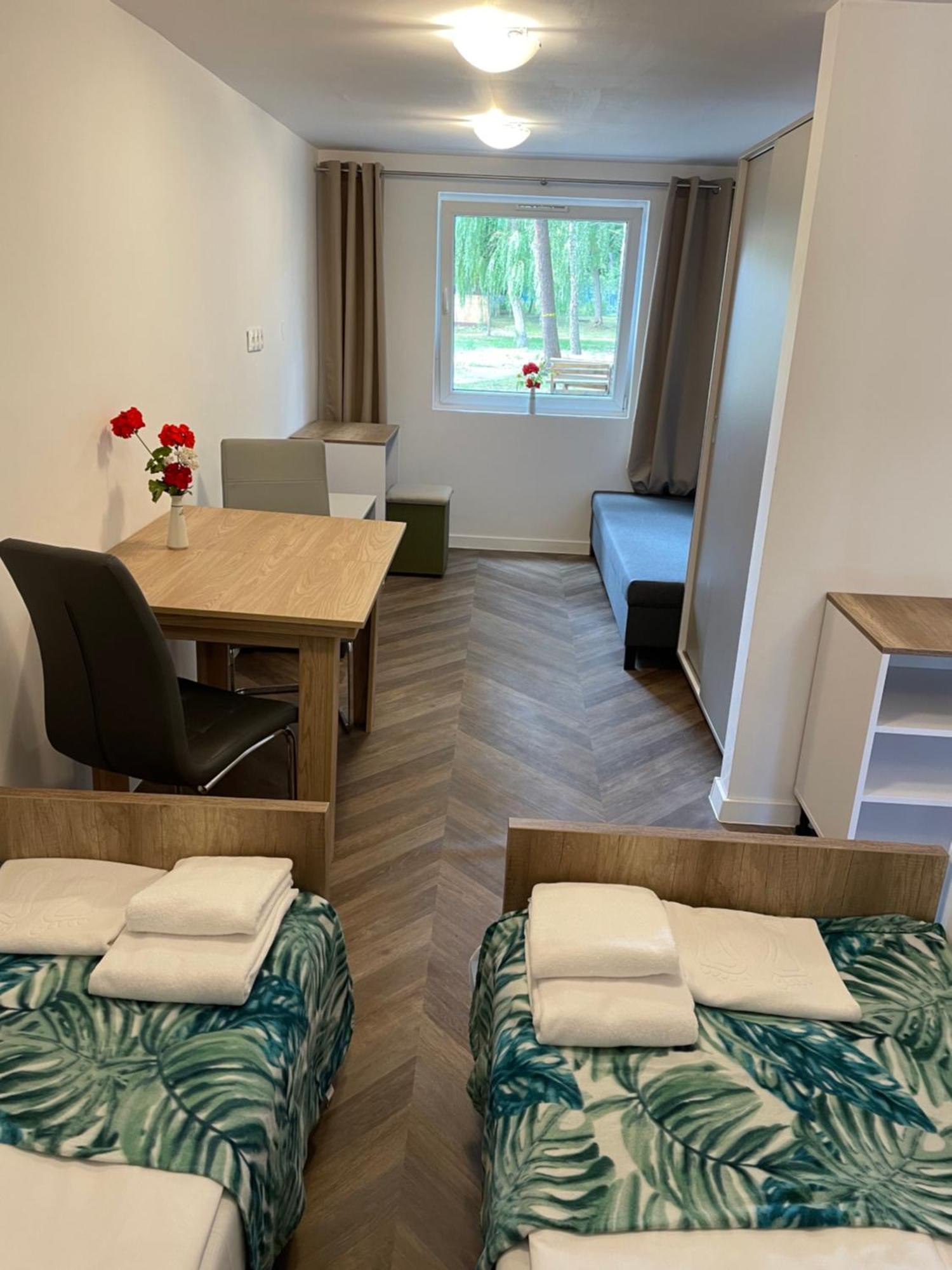 Domki Osrodek Wypoczynkowy Neptun Hotell Ujście-Darłowskie Exteriör bild